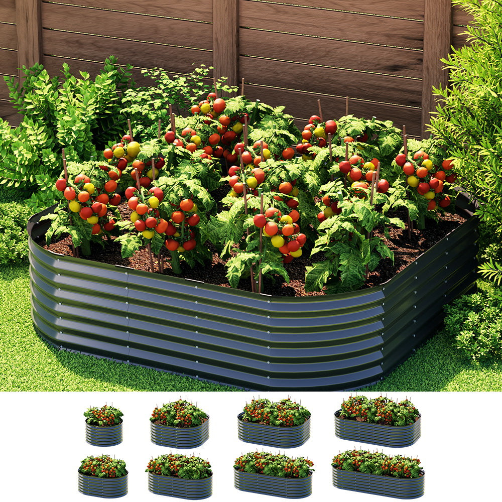 Olive coloured metal colour bond style Raised garden bed with lush green tomatoe plant filled with fruit agiast wood fence and green healthy garden background.