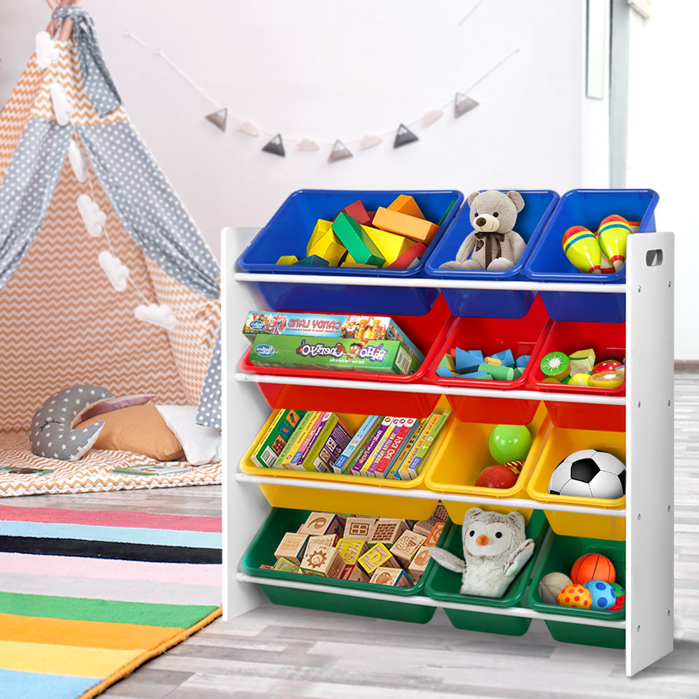 Baby and Kids toy storage and tidy bins red Blue green and yellow tubs mounted in a white wood frame filled with tidy toys.